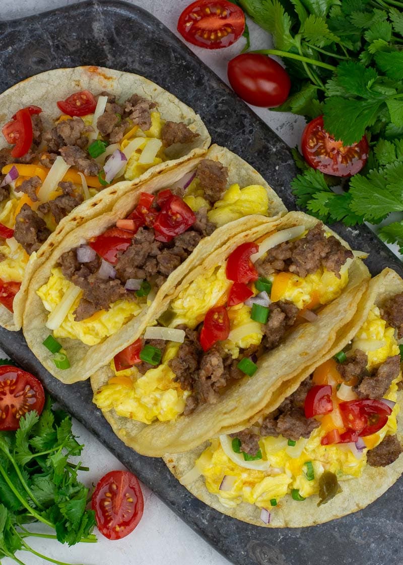 These Easy Breakfast Tacos are the best way to start the day! This simple breakfast recipe is packed full of protein and can be made ahead of time for a quick morning.