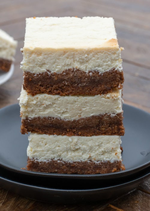 These Cheesecake Bars feature a sweet, buttery crust and smooth and creamy vanilla cheesecake filling! This is the perfect keto cheesecake recipe that is great by itself or with your favorite toppings!