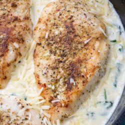 This easy Chicken Florentine recipe features herb crusted chicken and spinach with a rich and creamy wine wine sauce. This one pan dish is ready in under 30 minutes and is low carb and keto-friendly!