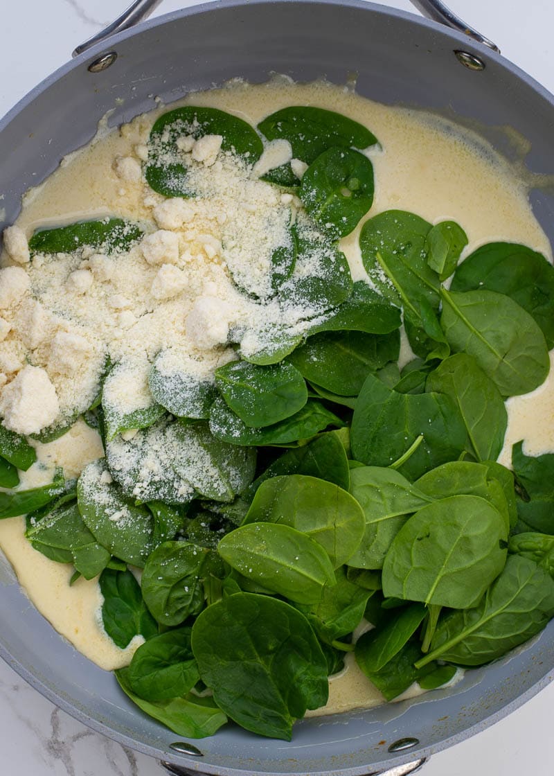 This easy Chicken Florentine recipe features herb crusted chicken and spinach with a rich and creamy wine wine sauce. This one pan dish is ready in under 30 minutes and is low carb and keto-friendly!