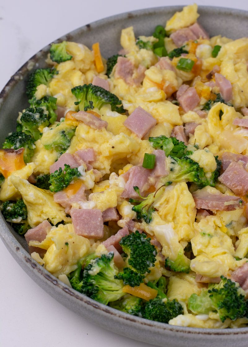 This Ham, Broccoli and Cheese Scramble is a hearty breakfast that will keep you full all day! These fluffy scrambled eggs are the perfect low carb, keto-friendly breakfast!