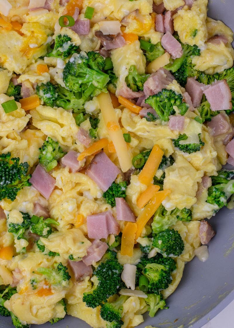 This Ham, Broccoli and Cheese Scramble is a hearty breakfast that will keep you full all day! These fluffy scrambled eggs are the perfect low carb, keto-friendly breakfast!