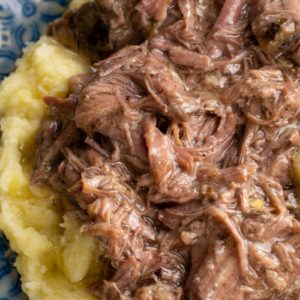 This Mississippi Pot Roast recipe is always a family favorite! This keto-friendly pot roast is made in a slow cooker with just four simple ingredients!