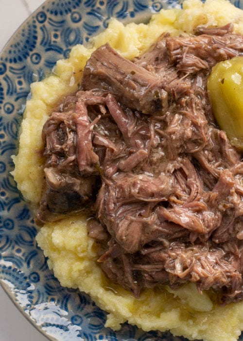 This Mississippi Pot Roast recipe is always a family favorite! This keto-friendly pot roast is made in a slow cooker with just four simple ingredients!