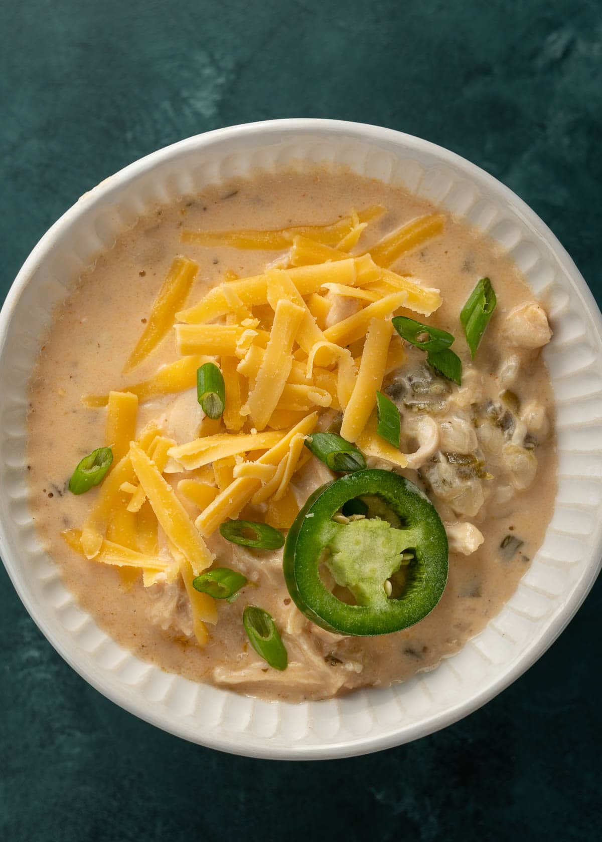 This Cheesy Jalapeno Chicken Soup has all the flavor of a jalapeno popper but in a creamy, hearty soup! Enjoy a serving of this keto-friendly soup for about 6 net carbs!