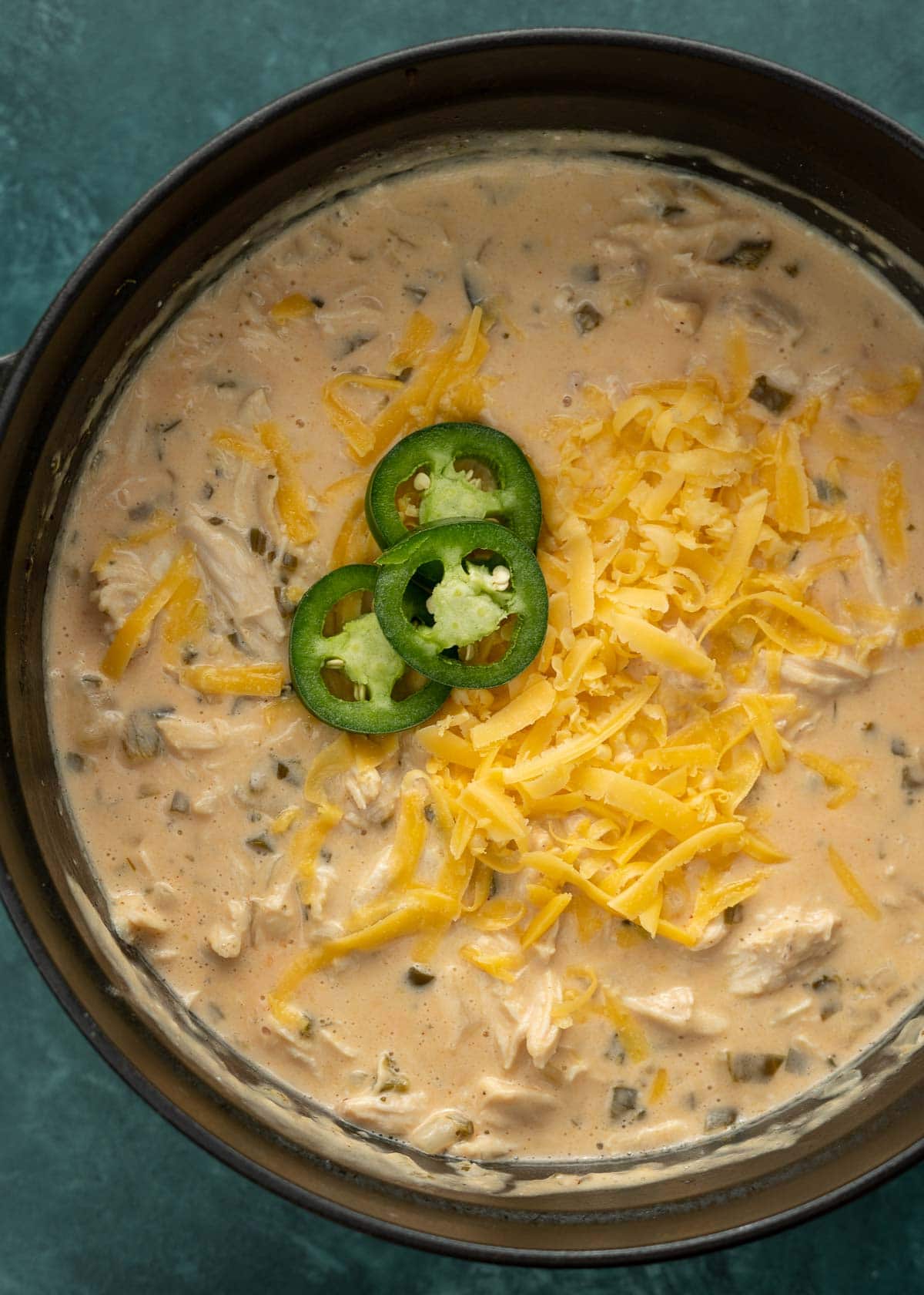 This Cheesy Jalapeno Chicken Soup has all the flavor of a jalapeno popper but in a creamy, hearty soup! Enjoy a serving of this keto-friendly soup for about 6 net carbs!