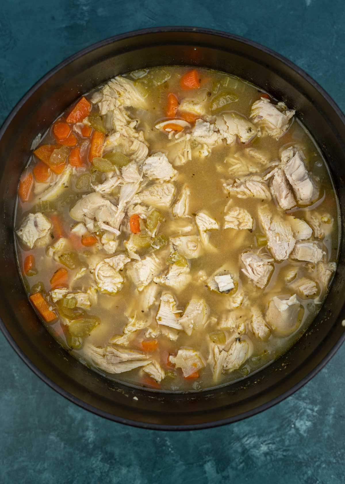 This creamy Chicken Gnocchi Soup recipe is the perfect comfort food! Tender chicken is paired with vegetables and gnocchi for a hearty, healthy meal!