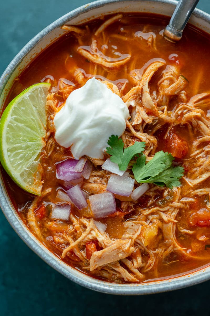 This delicious Chicken Fajita Soup is full of flavor and under 7 net carbs! Tender veggies, a spicy broth, and juicy chicken make this the BEST soup this season!
