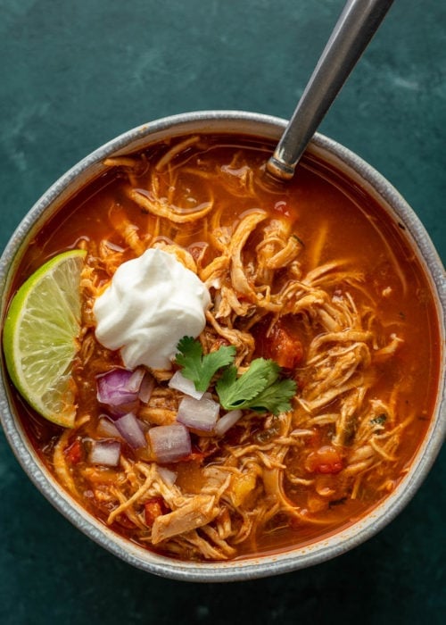 This delicious Chicken Fajita Soup is full of flavor and under 7 net carbs! Tender veggies, a spicy broth, and juicy chicken make this the BEST soup this season!