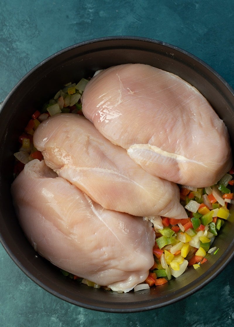 This delicious Chicken Fajita Soup is full of flavor and under 7 net carbs! Tender veggies, a spicy broth, and juicy chicken make this the BEST soup this season!