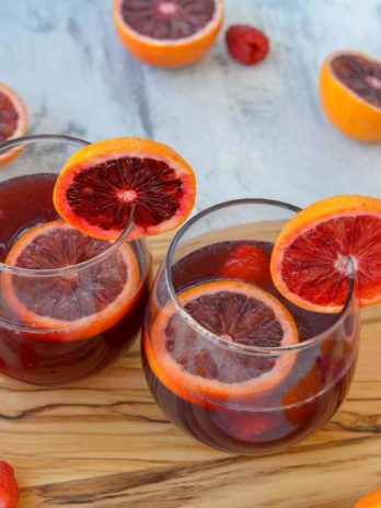 This delicious Blood Orange Raspberry Sangria is perfect for the red wine lover. It's the best cocktail for beautiful brunch and bridal shower menus!