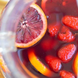 This delicious Blood Orange Raspberry Sangria is perfect for the red wine lover. It's the best cocktail for beautiful brunch and bridal shower menus!