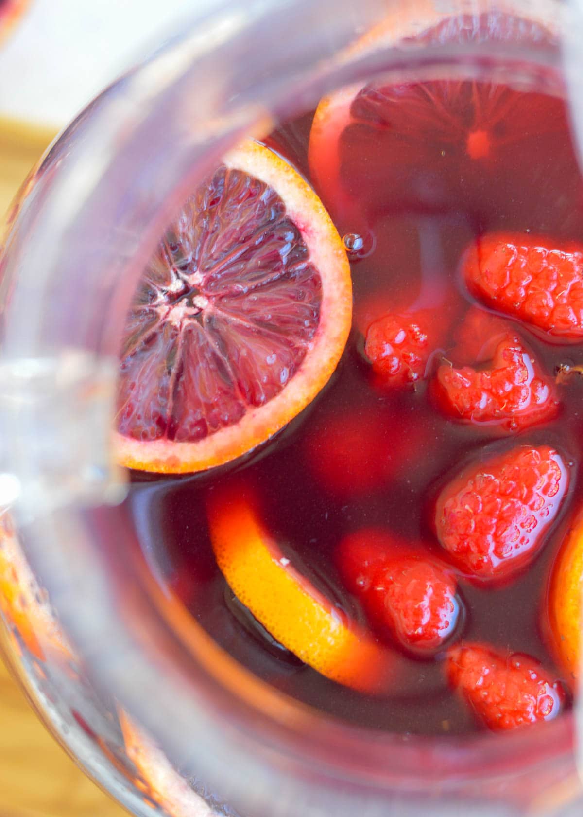 This delicious Blood Orange Raspberry Sangria is perfect for the red wine lover. It's the best cocktail for beautiful brunch and bridal shower menus!