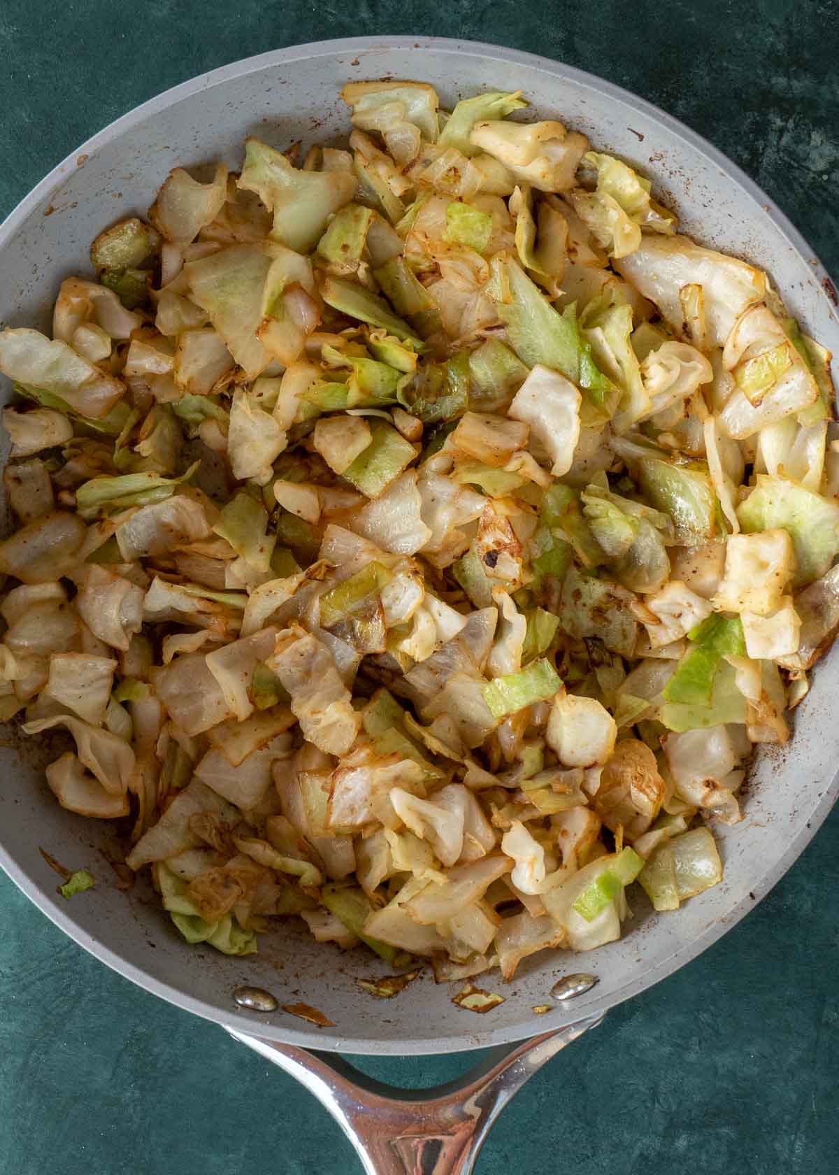 Need an easy low carb, one-pan dinner? I've got you covered! This Keto Sausage and Cabbage Skillet is ready in under 20 minutes and has less than 6 carbs per serving!