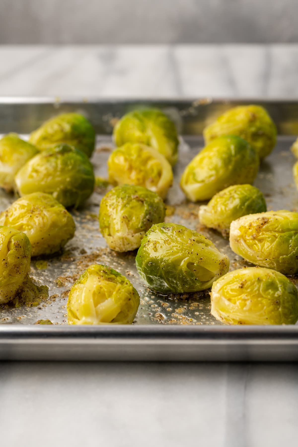 Seasoned Brussels sprouts on sheet pan