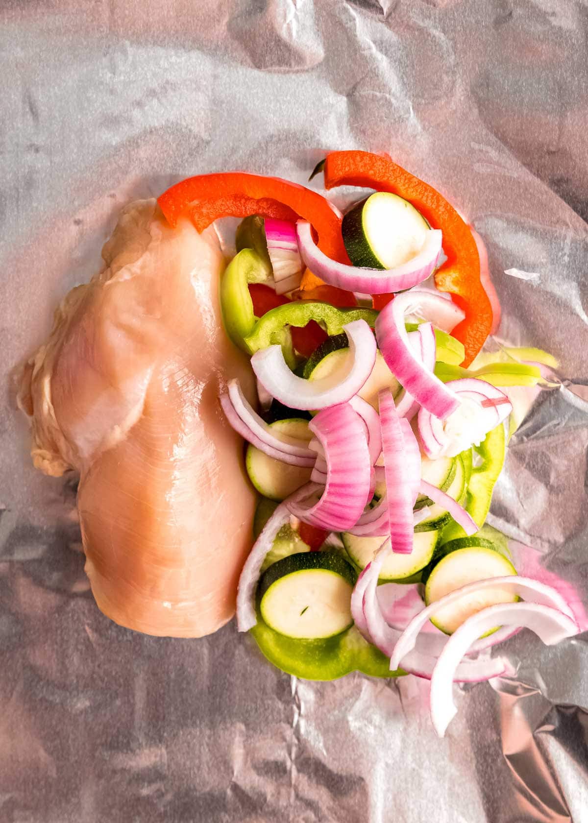 BBQ chicken and vegetables in foil