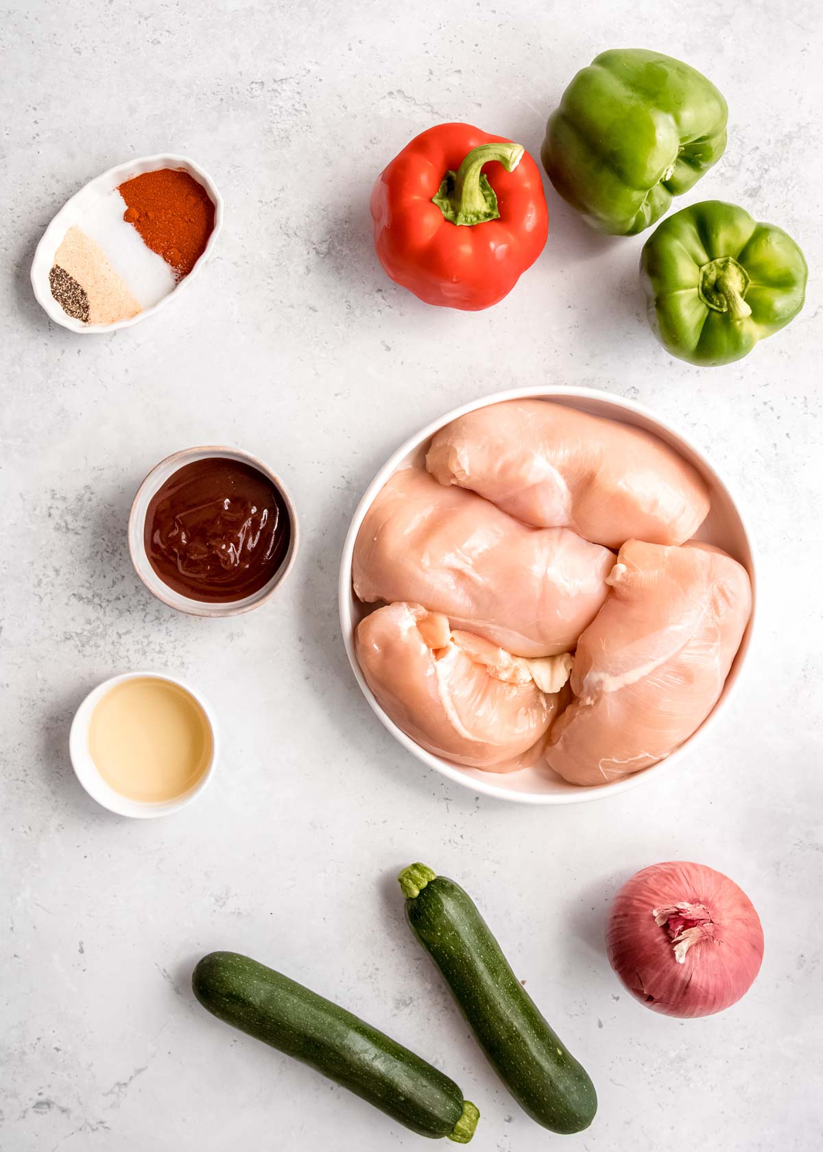 BBQ chicken foil pack ingredients on white table