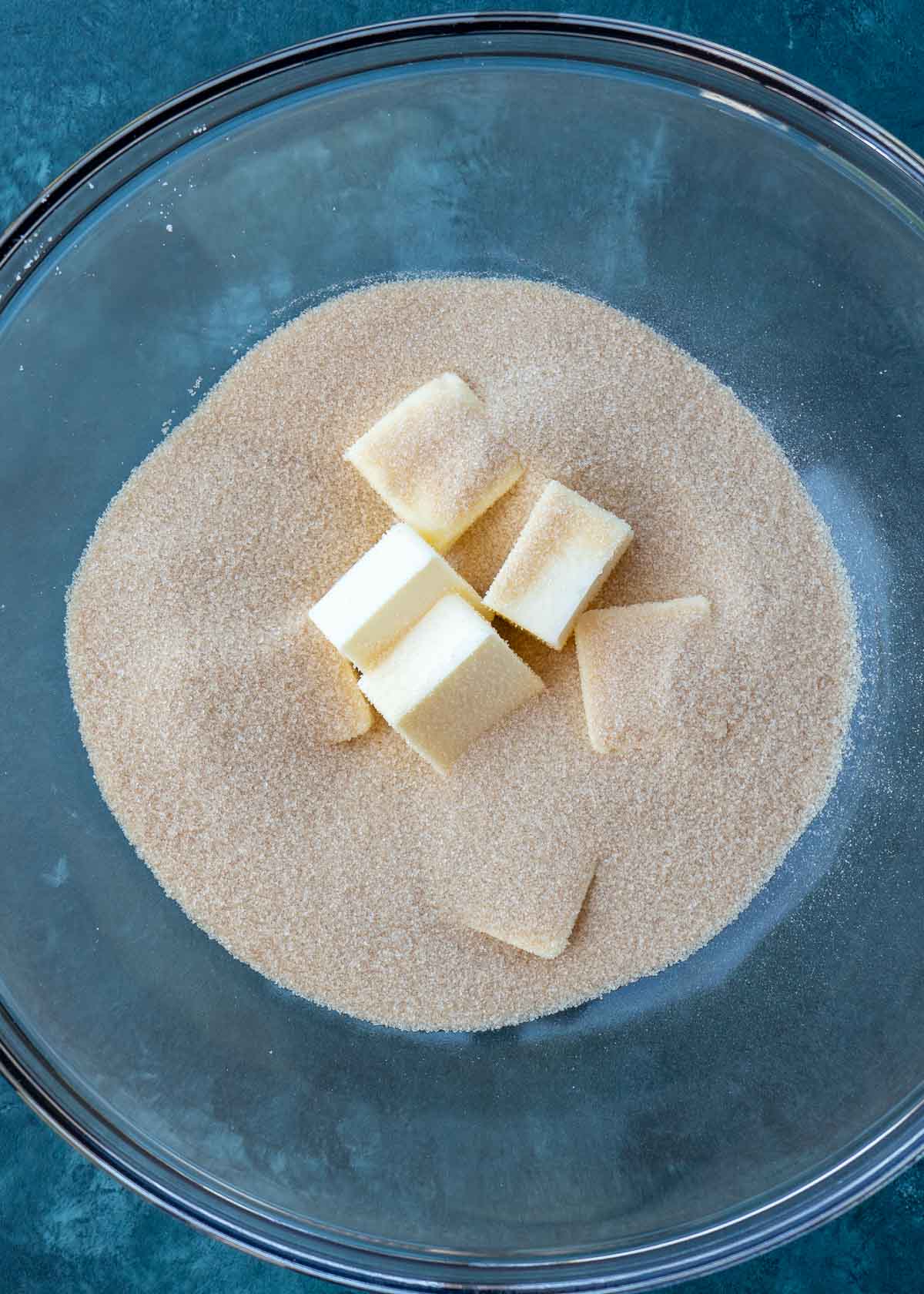 Butter and sweetener in a mixing bowl 
