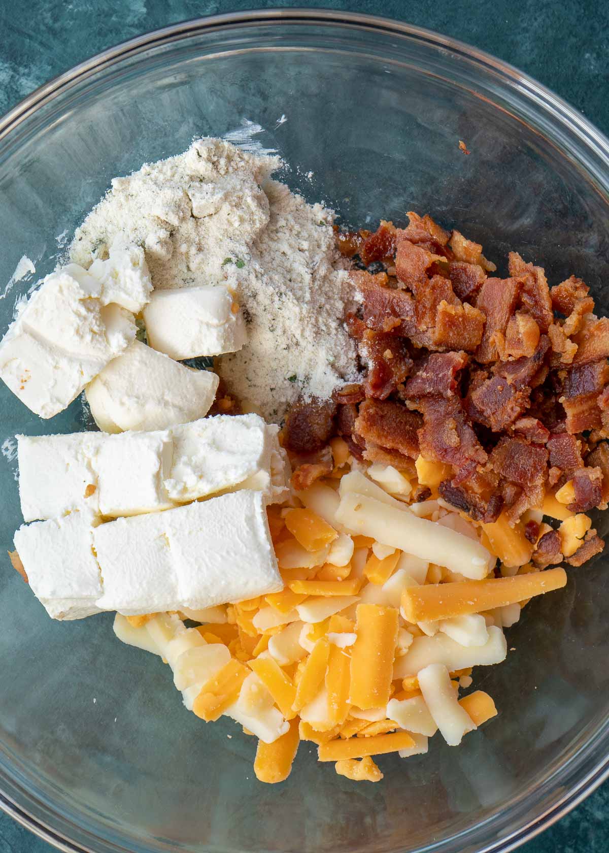 crack chicken ingredients in mixing bowl