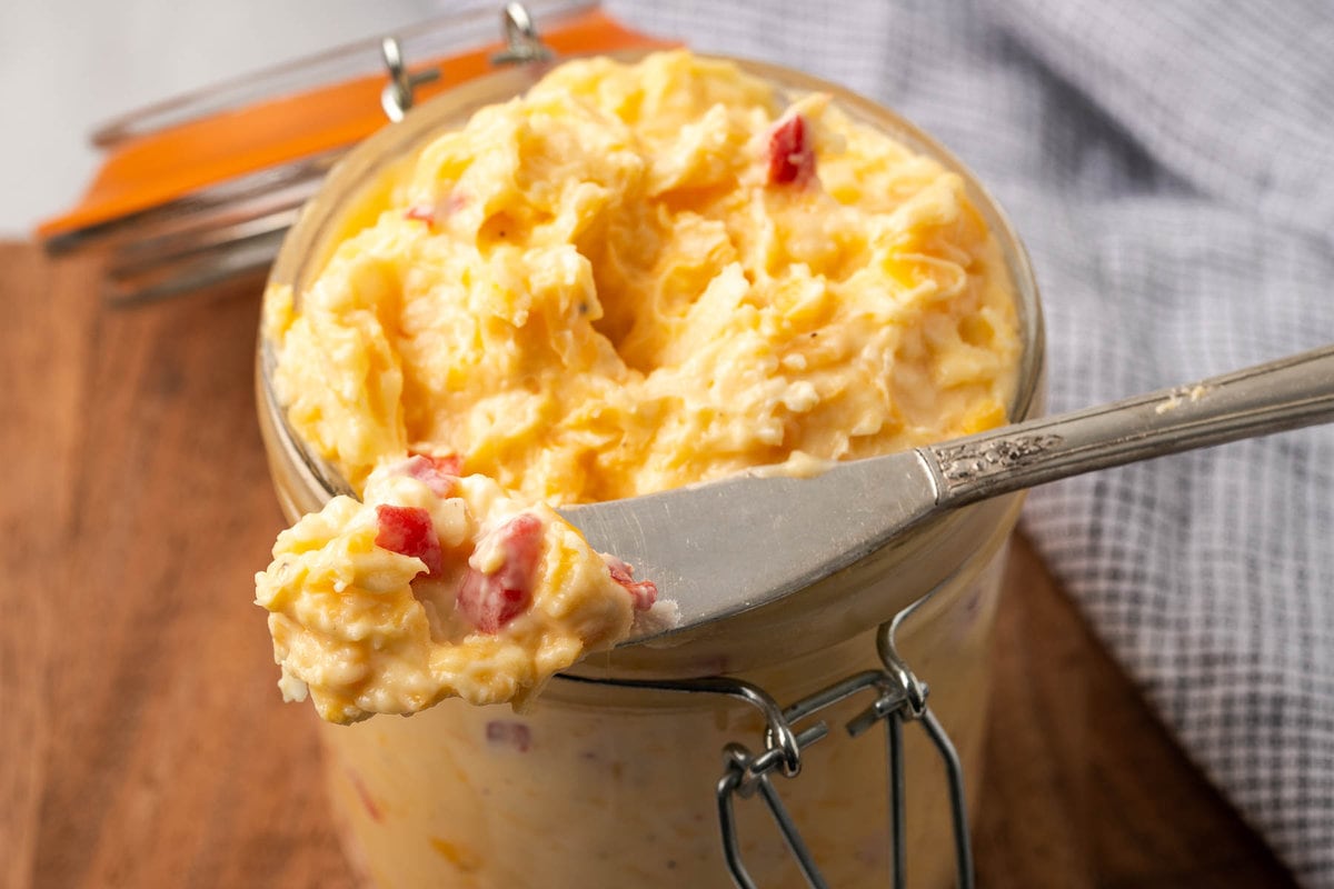 Pimento cheese in a clear glass
