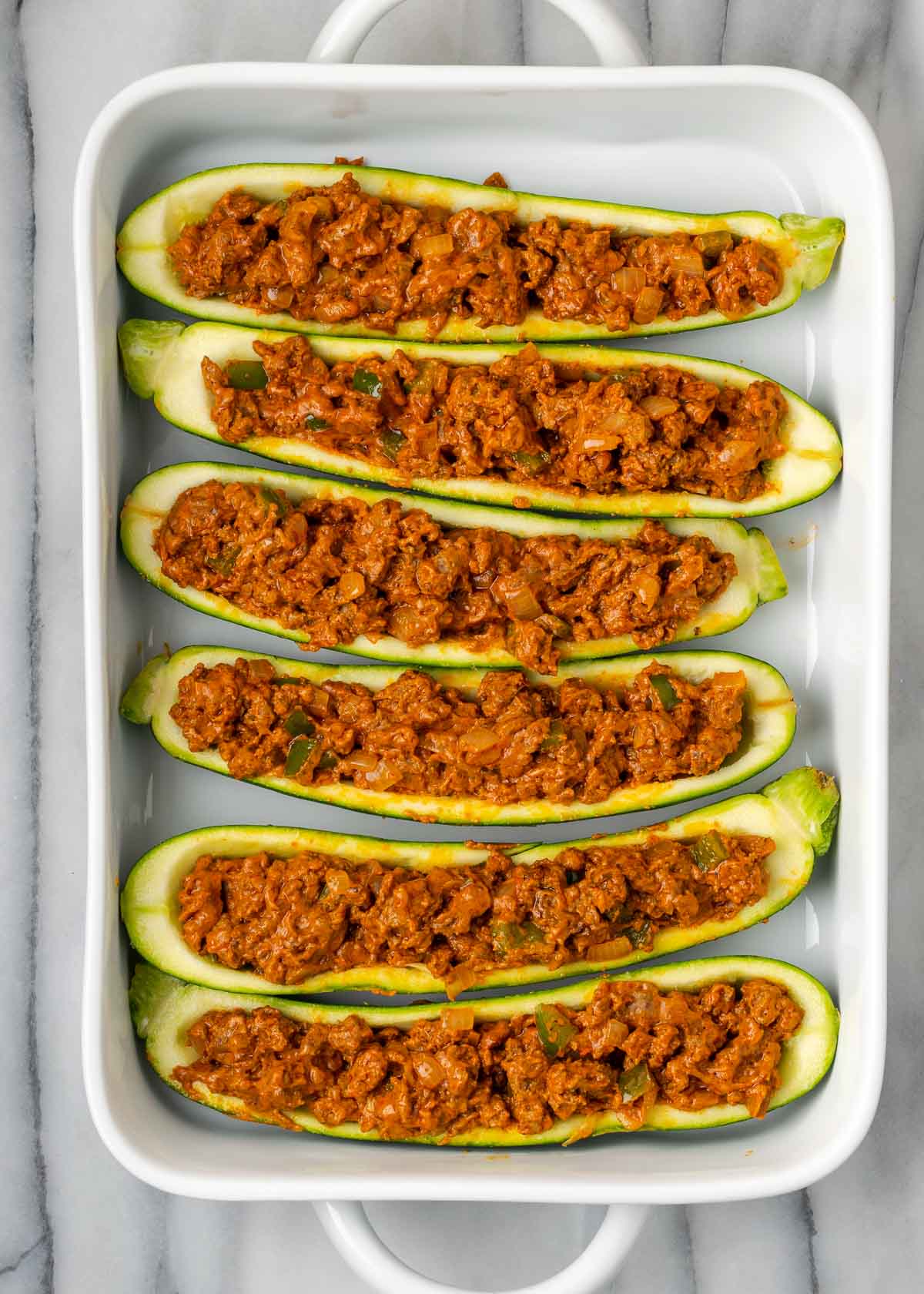 taco meat in stuffed zucchini