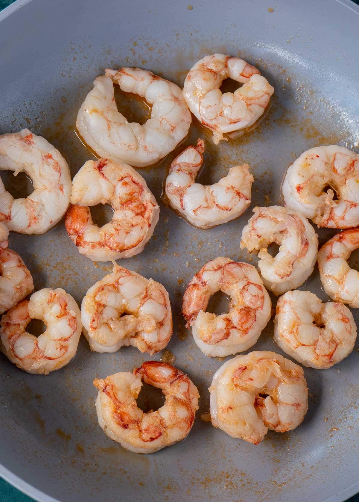 Shrimp cooking in a pan