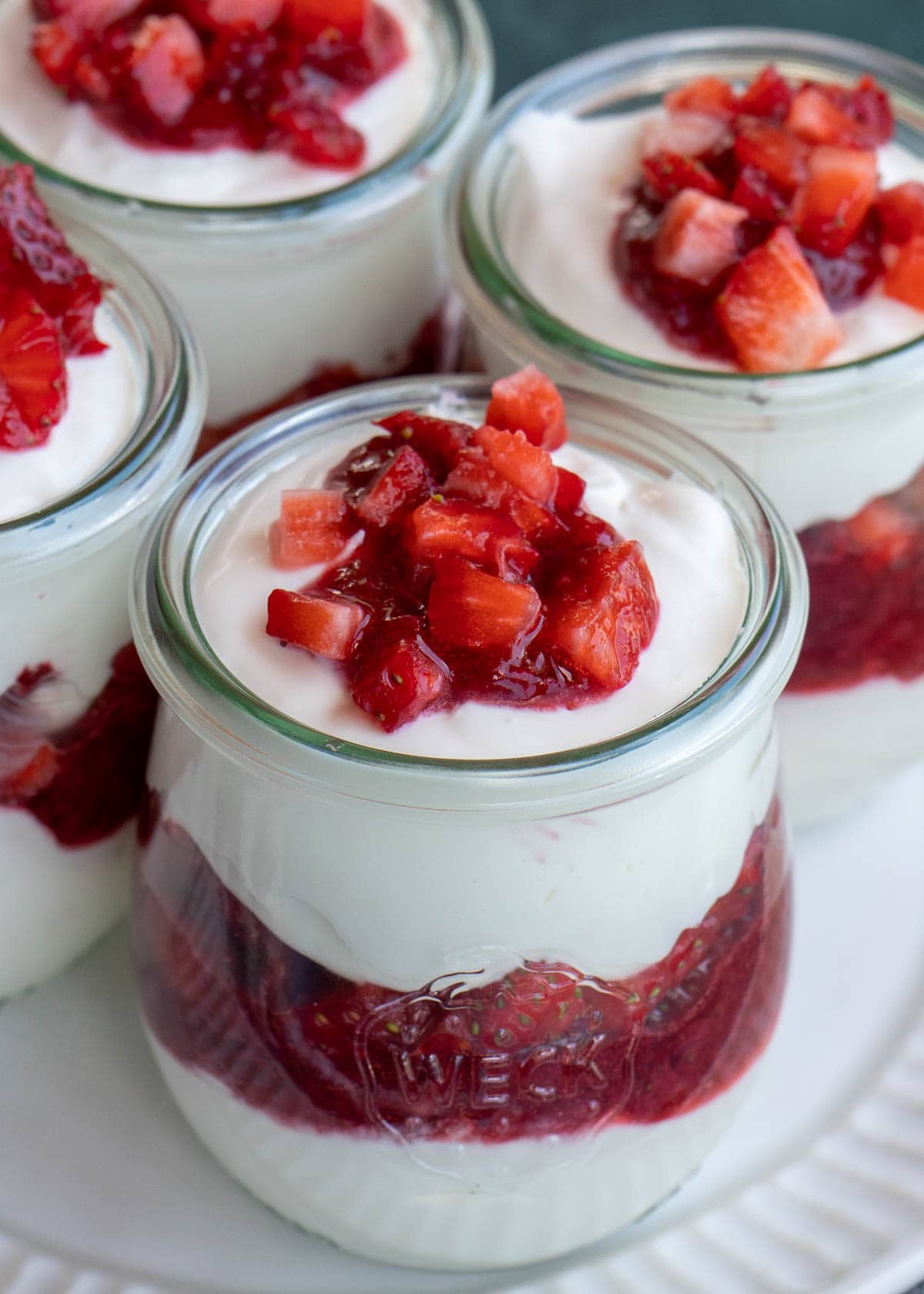 layered strawberry cheesecake jars