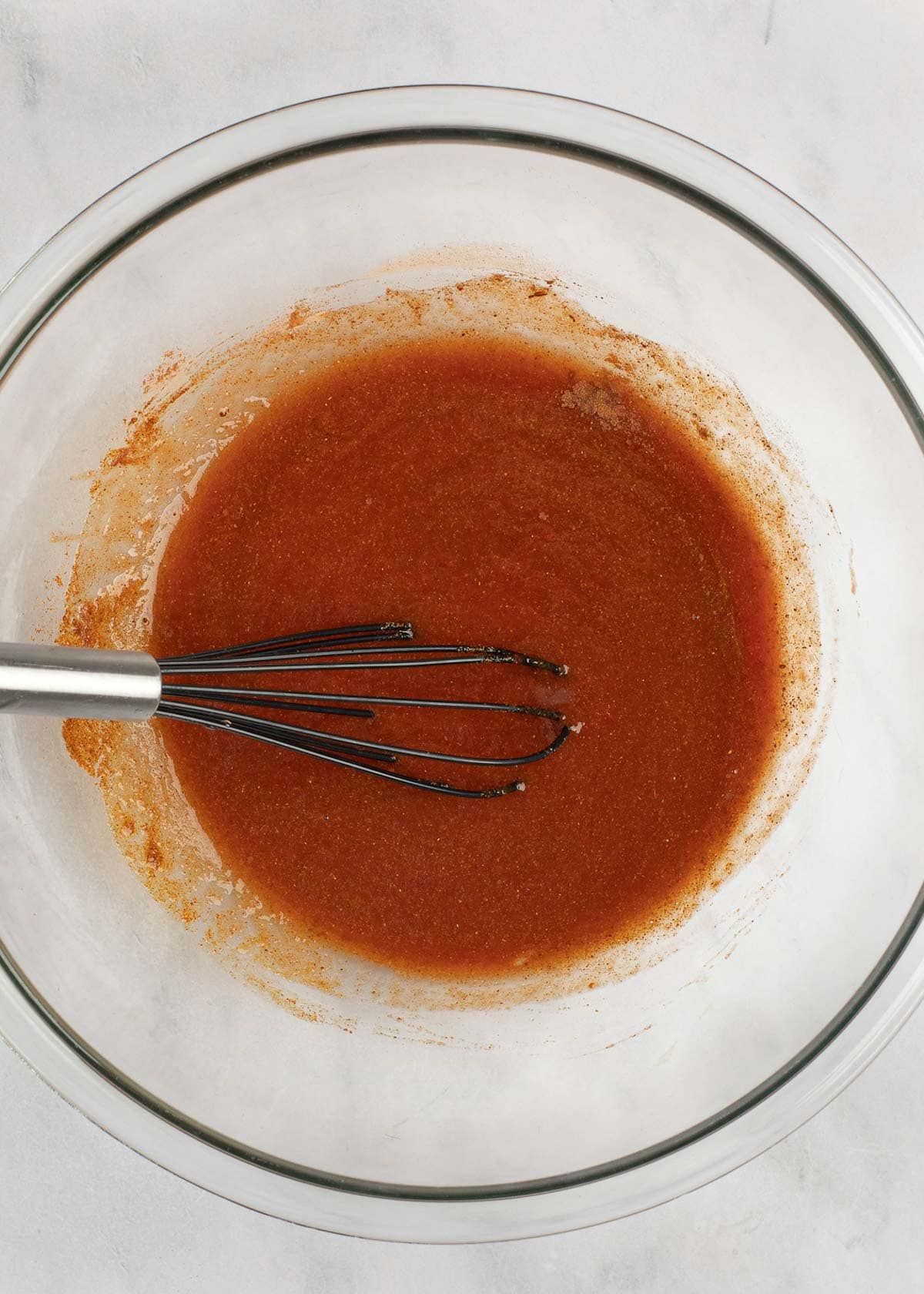 seasonings and marinade ingredients whisked together in a bowl