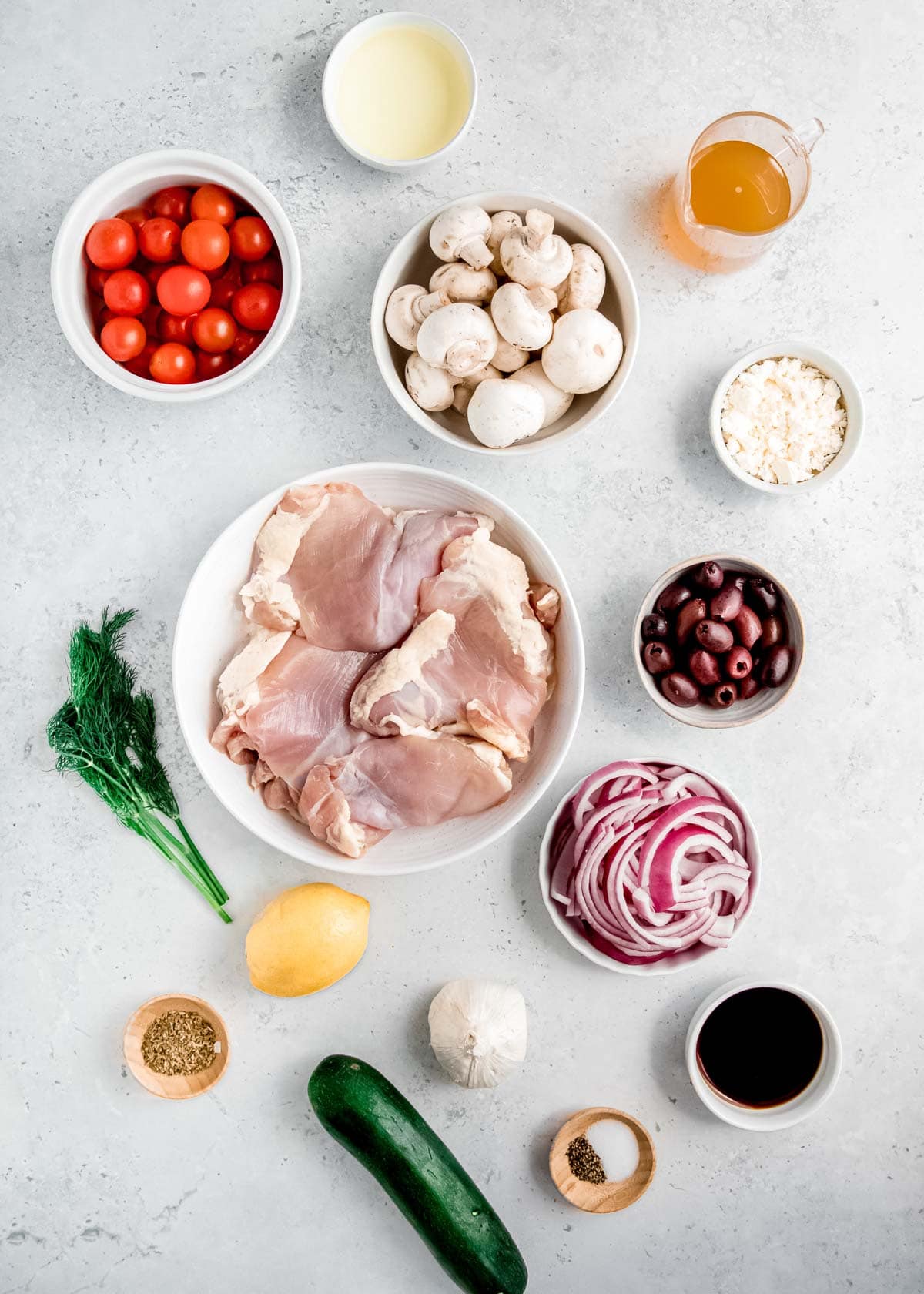 ingredients for one pan mediterranean chicken and veggies