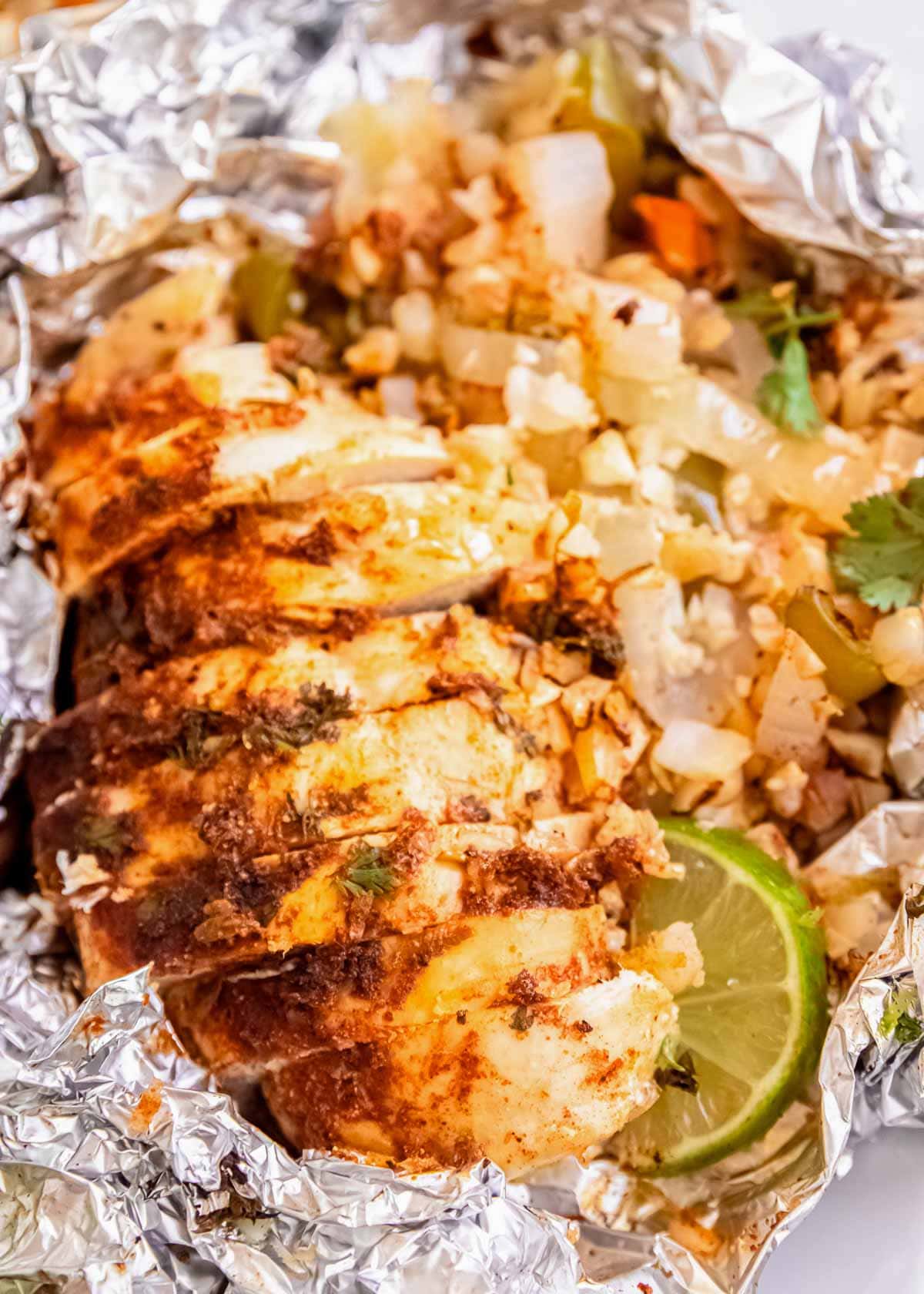 This easy Cilantro Lime Chicken Foil Pack is perfect for a busy weeknight or fun camping trip! This healthy recipe is packed with vegetables and full of fresh flavor.