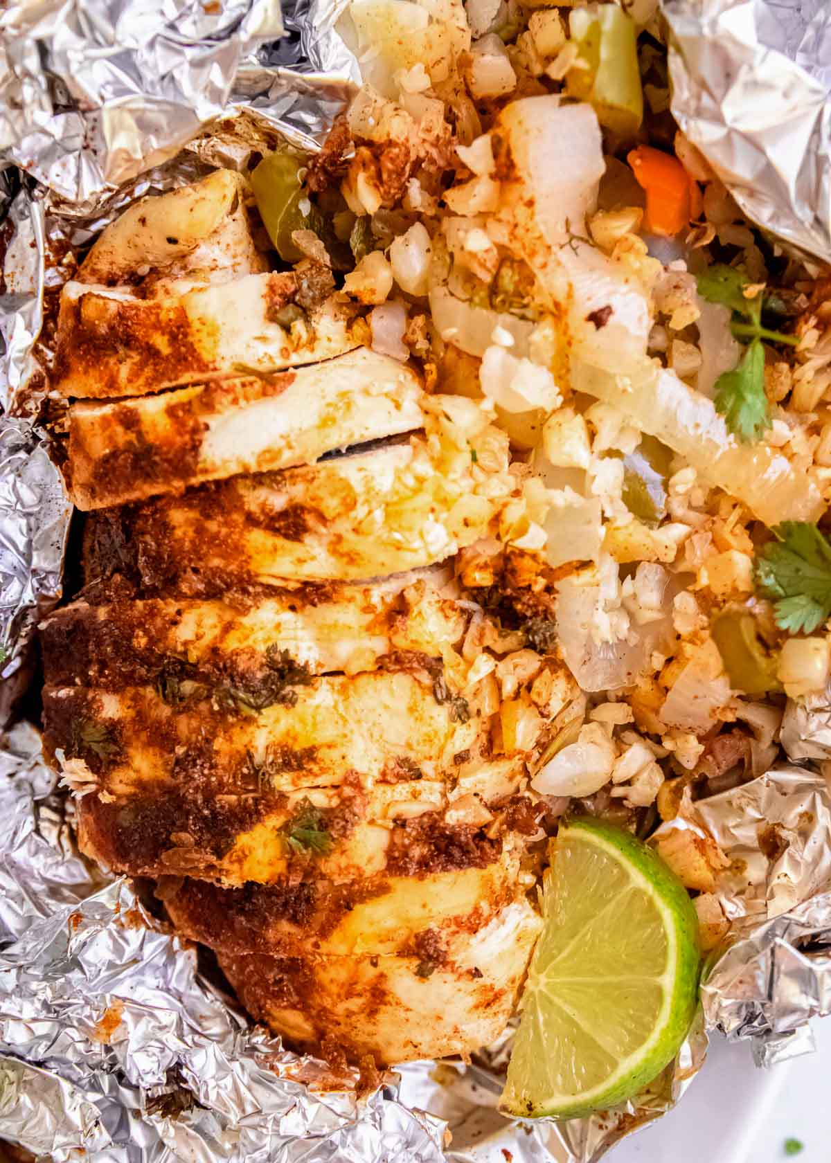 This easy Cilantro Lime Chicken Foil Pack is perfect for a busy weeknight or fun camping trip! This healthy recipe is packed with vegetables and full of fresh flavor.