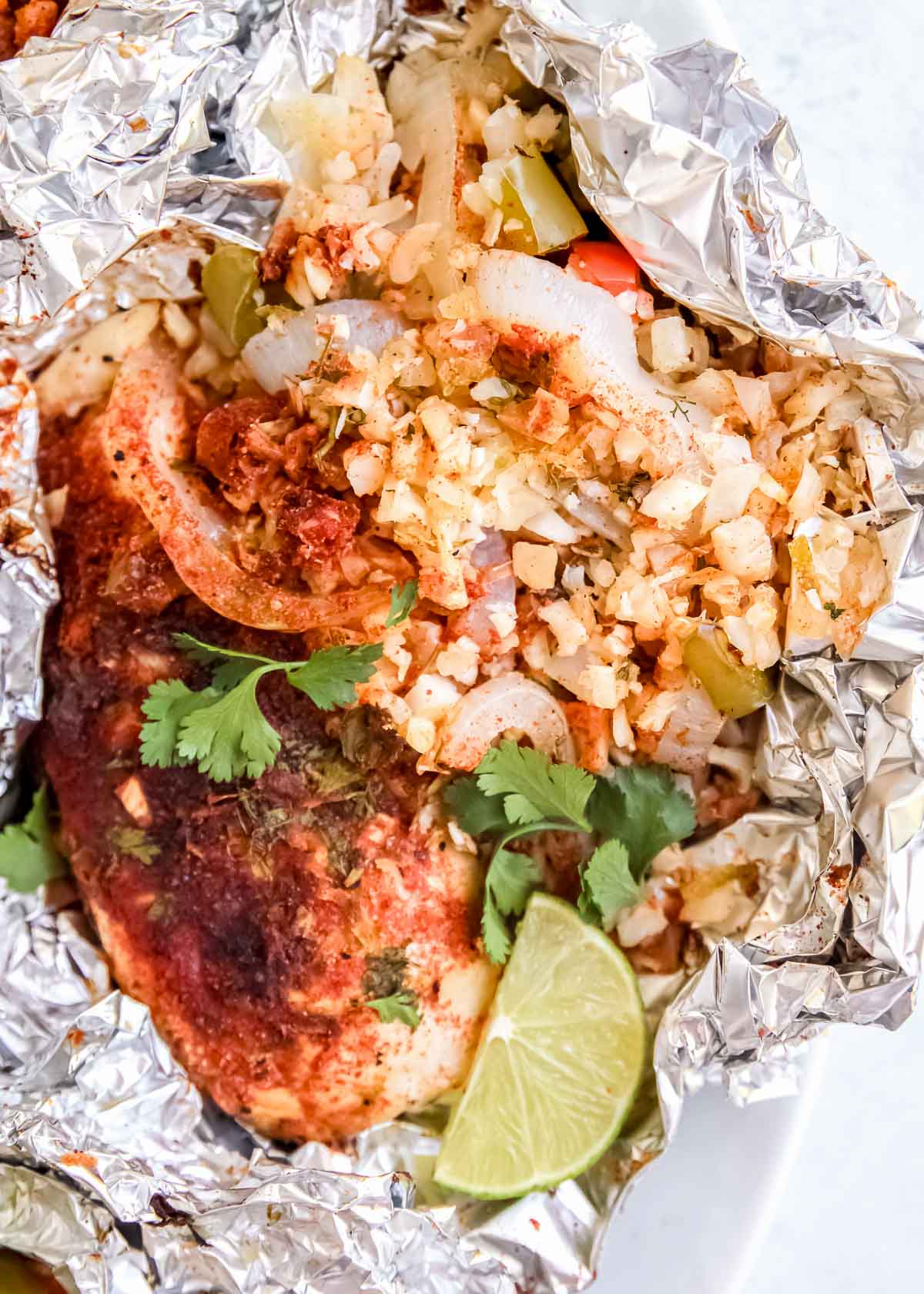 This easy Cilantro Lime Chicken Foil Pack is perfect for a busy weeknight or fun camping trip! This healthy recipe is packed with vegetables and full of fresh flavor.