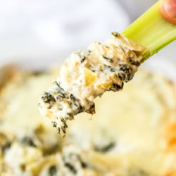 This classic Spinach Artichoke Dip is a favorite at the appetizer table! Perfect for lunches, potlucks, tailgating, and holidays.