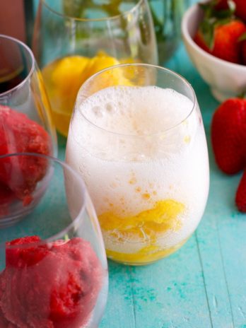 You only need 2 ingredients for these Fruit Sorbet and Sparkling Wine Floats! This elegant treat is SO easy and tastes delicious.