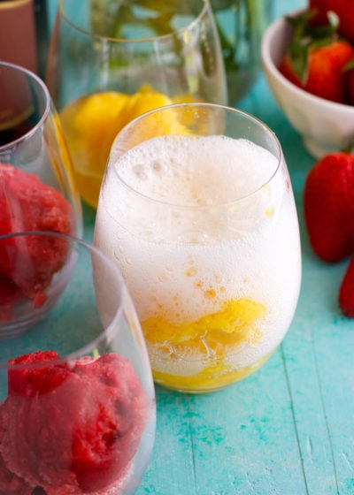 You only need 2 ingredients for these Fruit Sorbet and Sparkling Wine Floats! This elegant treat is SO easy and tastes delicious.
