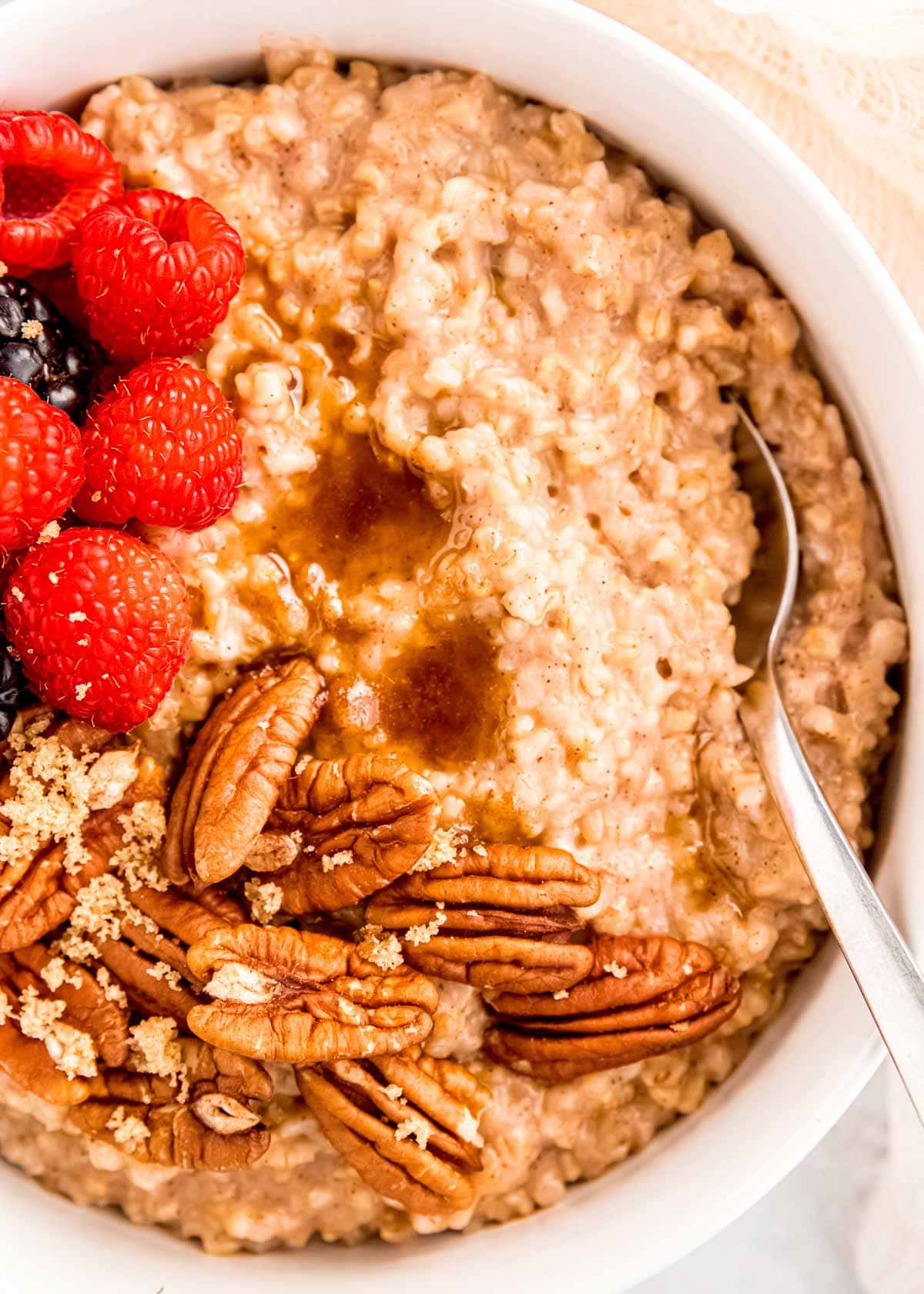 steel cut oatmeal in bowl with spoon