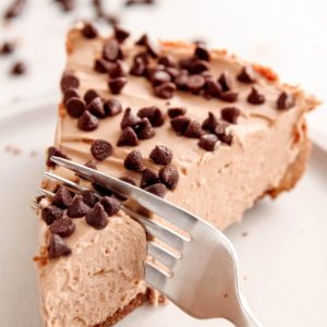 Enjoy unbelievable espresso flavor in this delicious No Bake Mocha Cheesecake! Rich, creamy, and perfect for holidays and celebrations.