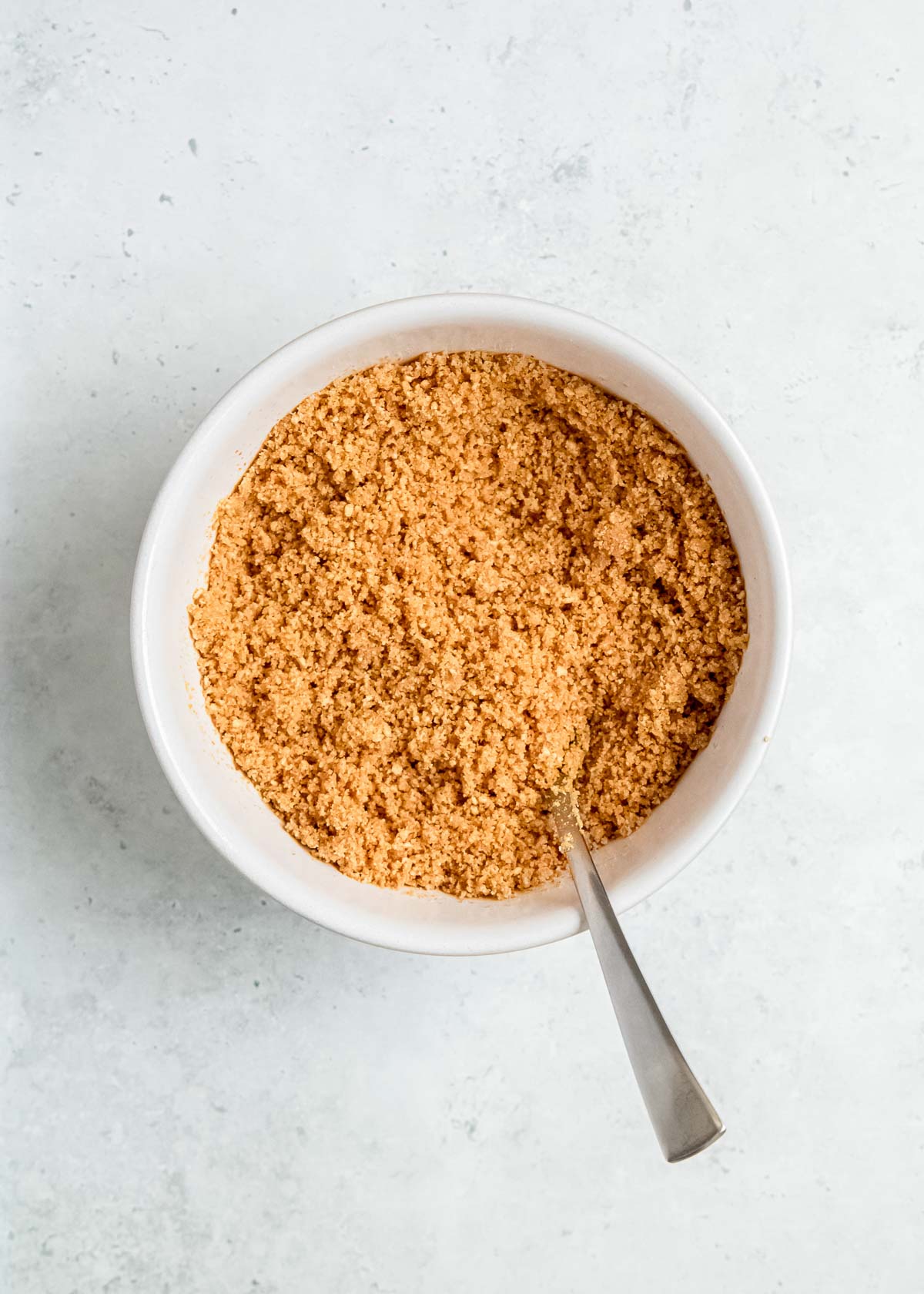 combine graham cracker crumbs, butter, and sugar for the crust