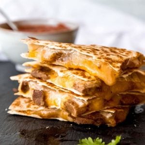 steak quesadilla on gray background