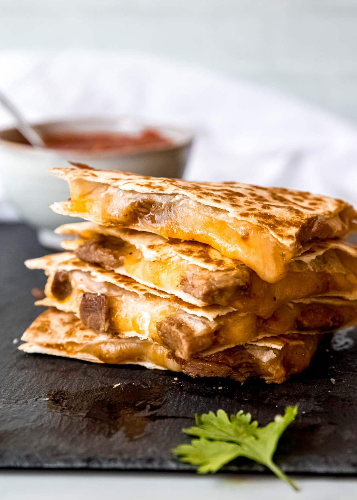 steak quesadilla on gray background