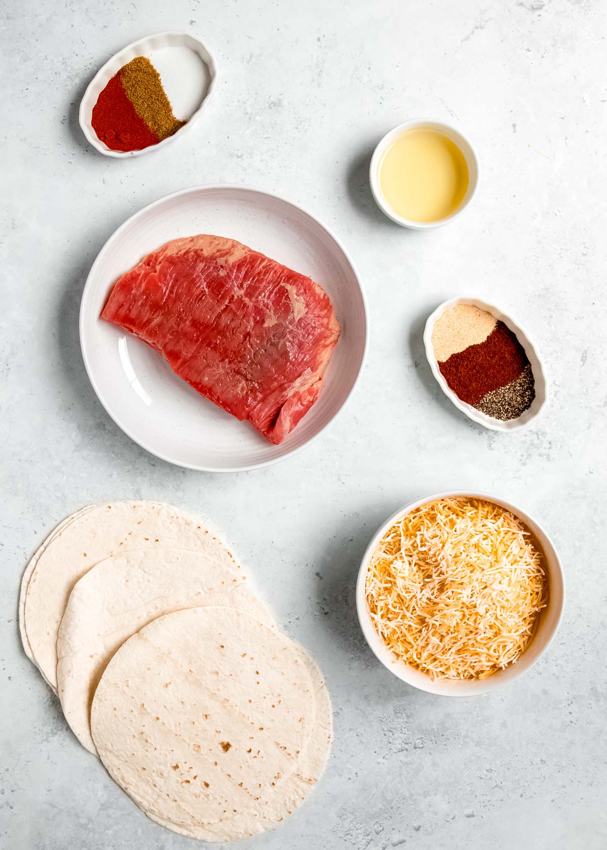 steak quesadilla ingredients on a white background