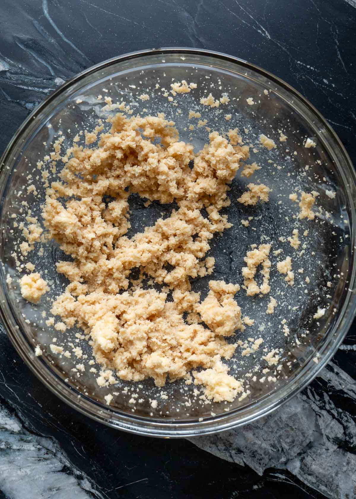 butter and brown sugar monk fruit mixed together in a glass bowl