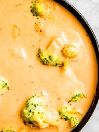 a bowl full of creamy broccoli cheddar soup