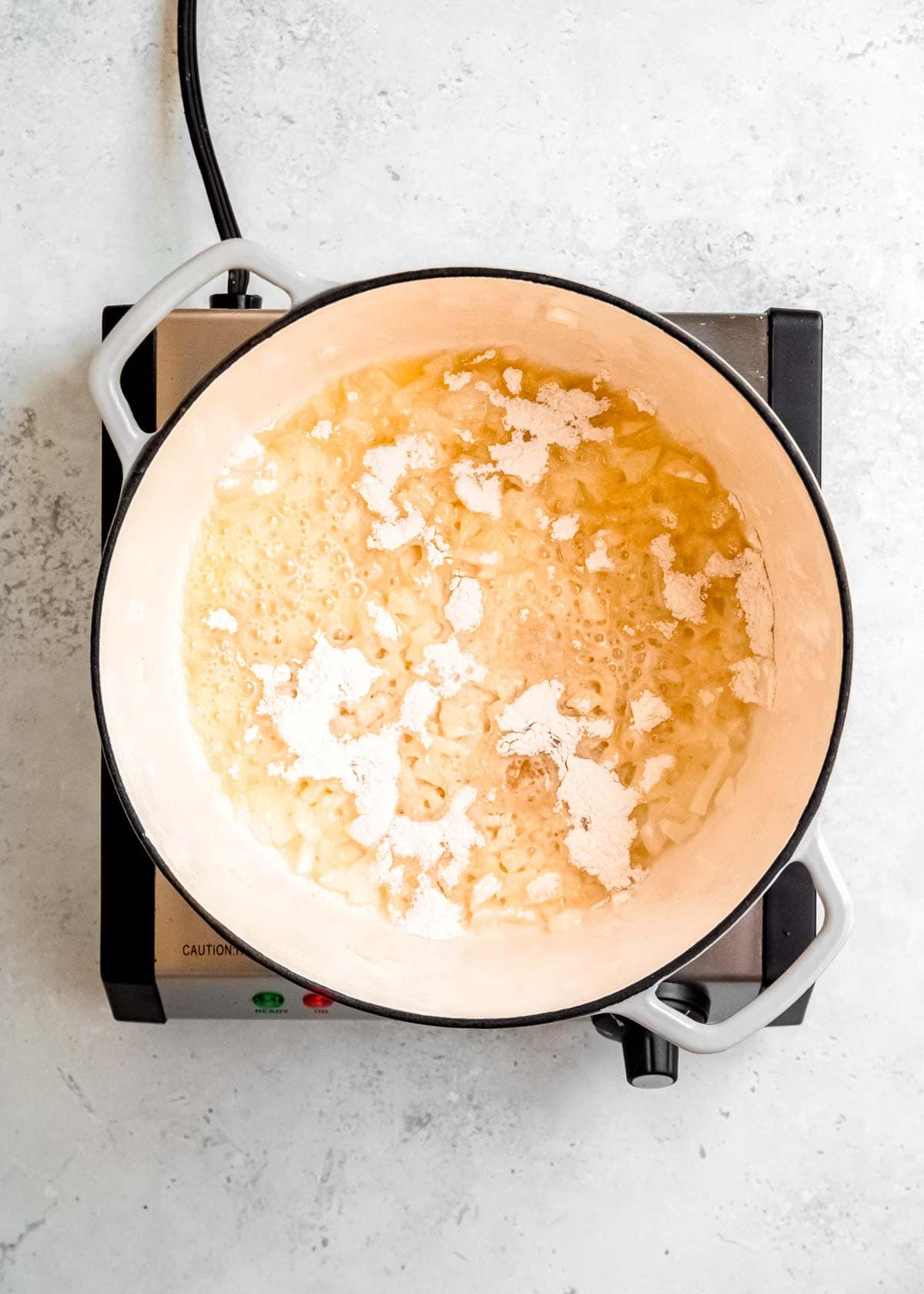 flour, onions and butter in dutch oven