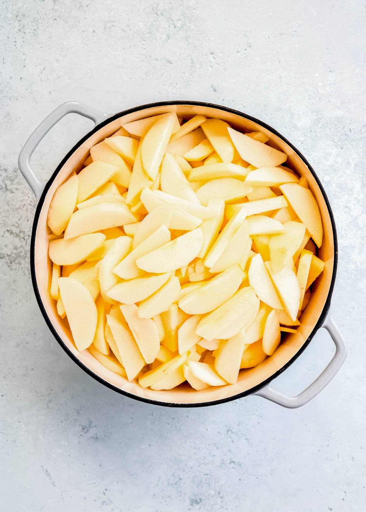 sliced apples in dutch oven