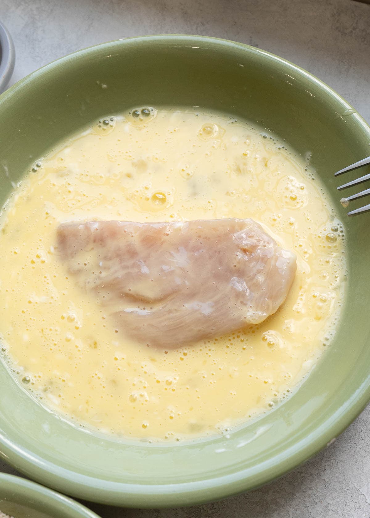 chicken tender in egg wash