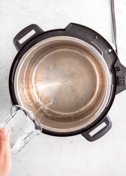 water being poured into instant pot