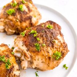 Instant Pot Chicken Thighs on white plate