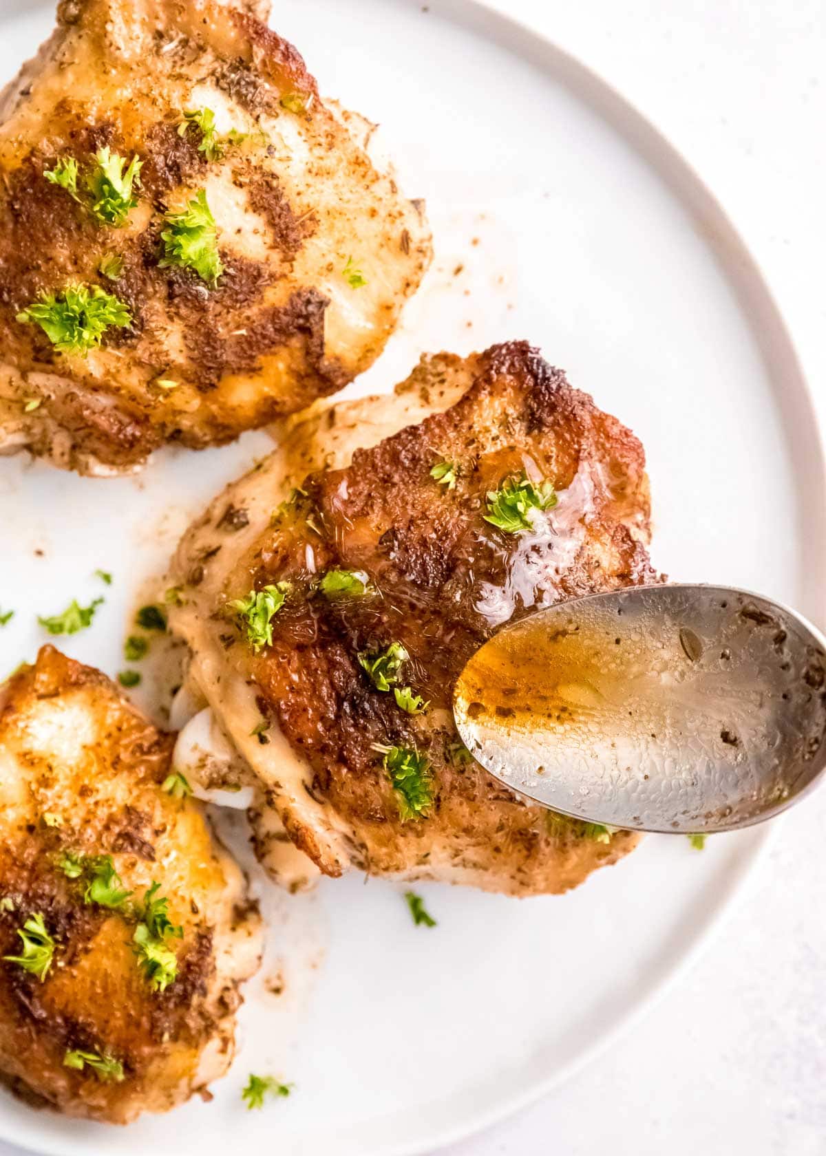 butter garlic sauce over chicken thighs