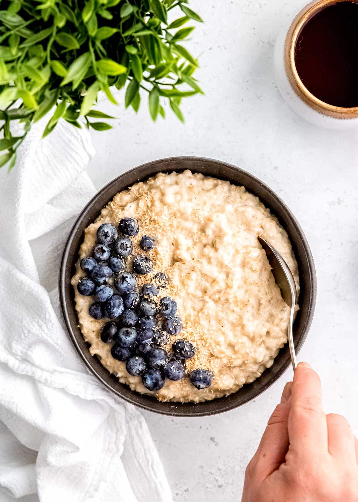 an overhead shot of oatmeal and blueberries